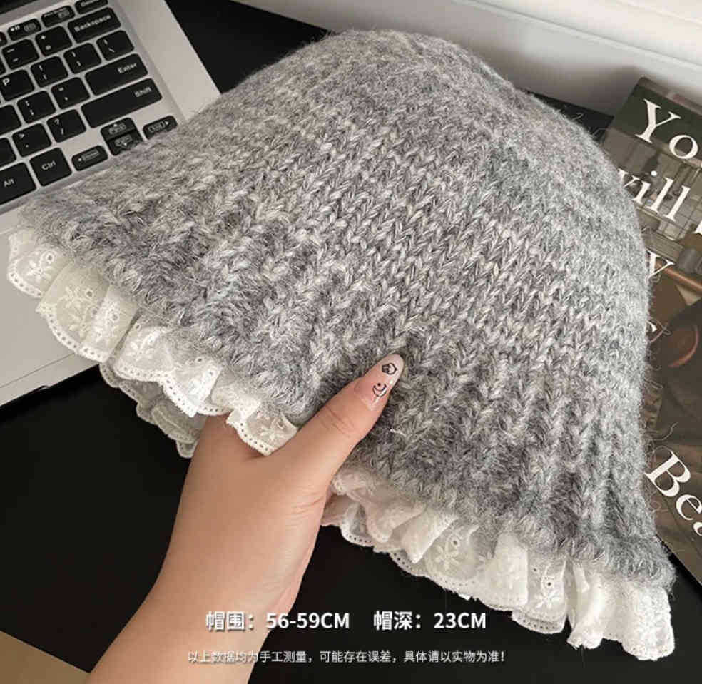 怠zyなスタイルの帽子女性秋と冬の甘いレースニットウールの帽子は、小さな暖かくて一致する盆地の帽子を示しています